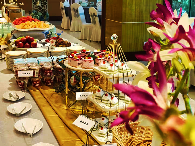 建国快餐企业举办“浓情三月，甜蜜加倍”甜品制作活动